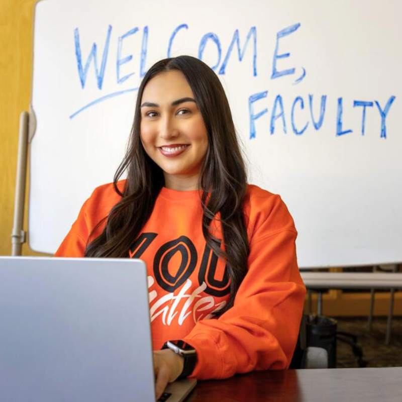 Alyssa Drake Alyssa Drake in front of a computer