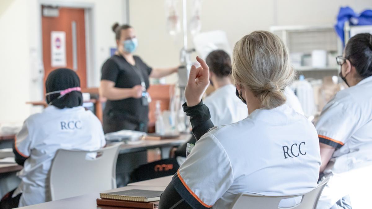 RCC Nursing Student Raising Hand