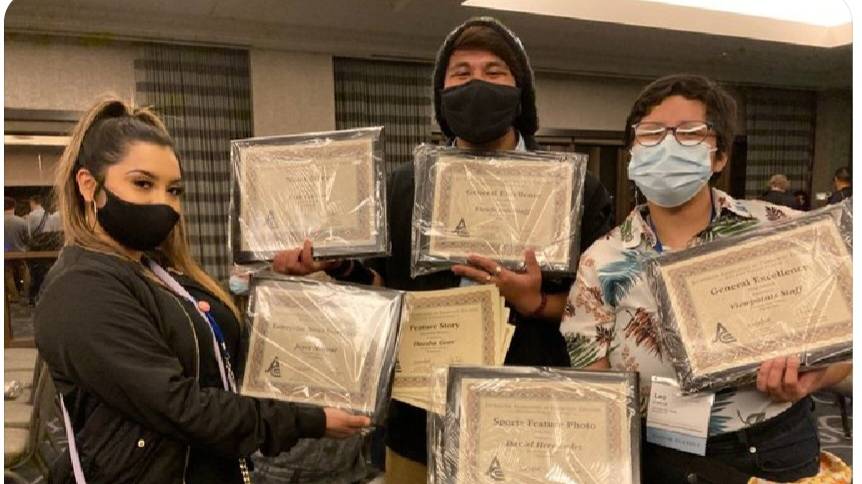 Viewpoint students Jennipher Vasquez, john Guerrero and Leo Cabal holding the spring journalism conference awards