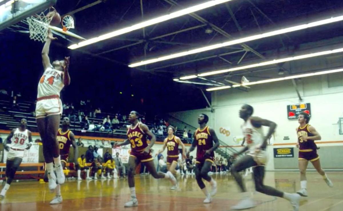 Julius Thomas playing basketball